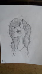 Size: 2304x4096 | Tagged: safe, artist:awesomedude14, derpibooru exclusive, imported from derpibooru, fluttershy, pony, bust, ear piercing, female, monochrome, paper, pencil drawing, photo, piercing, sad, solo, traditional art