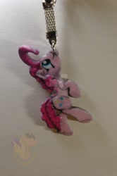 Size: 1024x1539 | Tagged: safe, artist:king-franchesco, imported from derpibooru, pinkie pie, earth pony, pony, cutie mark, female, hooves, irl, keychain, mare, mouth hold, photo, solo