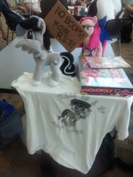 Size: 720x960 | Tagged: safe, artist:onlyfactory, artist:valmiiki, imported from derpibooru, pinkie pie, oc, oc:chopsticks, pegasus, pony, bronycon, bootleg, clothes, hat, imminent boop, imminent non-consensual booping, irl, photo, pinkamena diane pie, plushie, sign, sunglasses, wing hands