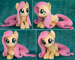 Size: 1826x1458 | Tagged: safe, artist:buttercupbabyppg, imported from derpibooru, fluttershy, pegasus, pony, cute, daaaaaaaaaaaw, female, folded wings, happy, hnnng, irl, looking up, lying, mare, photo, plushie, shyabetes, smiling, solo, weapons-grade cute