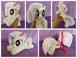 Size: 1024x768 | Tagged: safe, artist:equinepalette, imported from derpibooru, oc, oc only, oc:mangolia mane, pegasus, pony, beanie (plushie), female, hand, irl, mare, photo, plushie, prone, ribbon, solo