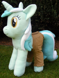Size: 1056x1394 | Tagged: safe, artist:hoppip, imported from derpibooru, lyra heartstrings, pony, unicorn, clothes, female, infamous, irl, lyra plushie, mare, outdoors, pants, photo, plothole plush lyra, plushie, side view, smiling, solo, standing, tail, tail hole