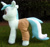 Size: 1233x1166 | Tagged: safe, artist:hoppip, imported from derpibooru, lyra heartstrings, pony, unicorn, clothes, female, infamous, irl, lyra plushie, mare, outdoors, pants, photo, plothole plush lyra, plushie, pocket, side view, smiling, solo, standing, tail, tail hole