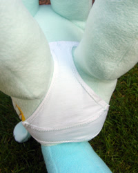 Size: 958x1200 | Tagged: safe, artist:hoppip, imported from derpibooru, lyra heartstrings, pony, unicorn, butt, close-up, clothes, female, infamous, irl, legs in air, lying, lyra plushie, mare, on back, outdoors, panties, photo, plot, plothole plush lyra, plushie, rear view, solo, underwear