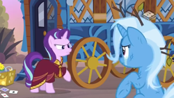 Size: 1280x720 | Tagged: safe, imported from derpibooru, screencap, starlight glimmer, trixie, pony, unicorn, road to friendship, clothes, crying, duo, duo female, female, hoo'far's wagon, mare, messy mane, robe, teary eyes, tree branch, wagon