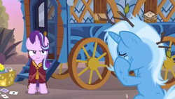 Size: 1280x720 | Tagged: safe, imported from derpibooru, screencap, starlight glimmer, trixie, pony, unicorn, road to friendship, angry, clothes, crying, duo, duo female, female, gritted teeth, hoo'far's wagon, low quality, mare, messy mane, robe, teary eyes, tree branch, wagon