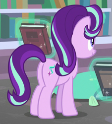 Size: 473x523 | Tagged: safe, imported from derpibooru, screencap, starlight glimmer, pony, unicorn, the end in friend, book, butt, cropped, female, glowing horn, horn, magic, mare, plot, smiling, solo, telekinesis