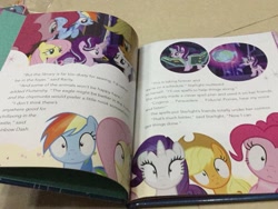 Size: 960x720 | Tagged: safe, imported from derpibooru, applejack, fluttershy, pinkie pie, rainbow dash, rarity, starlight glimmer, every little thing she does, book, fiducia compellia, irl, mind control, photo