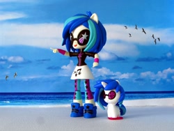 Size: 1600x1200 | Tagged: safe, artist:whatthehell!?, imported from derpibooru, dj pon-3, vinyl scratch, pony, unicorn, equestria girls, beach, clothes, cutie mark crew, doll, equestria girls minis, glasses, gulls, human ponidox, irl, leggings, merchandise, ocean, photo, self ponidox, shoes, skirt, sneakers, sunglasses, toy