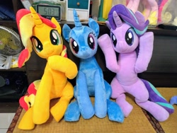 Size: 2048x1536 | Tagged: safe, artist:nekokevin, imported from derpibooru, starlight glimmer, sunset shimmer, trixie, pony, unicorn, series:nekokevin's glimmy, amazed, irl, photo, plushie, varying degrees of want, wow