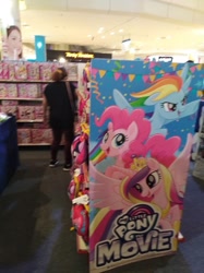 Size: 717x960 | Tagged: safe, imported from derpibooru, photographer:horsesplease, pinkie pie, princess cadance, rainbow dash, my little pony: the movie, irl, malaysia, my little pony logo, photo, shopping mall, toy