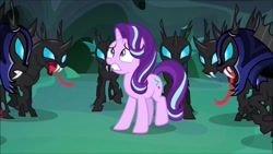 Size: 1280x720 | Tagged: safe, imported from derpibooru, screencap, starlight glimmer, thorax, changeling, pony, unicorn, to where and back again, armor, changeling armor, changeling guard, disguise, disguised changeling, fake starlight glimmer, female, mare, scared, sweat, tongue out