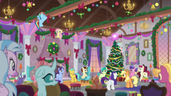 Size: 1920x1080 | Tagged: safe, imported from derpibooru, screencap, applejack, berry blend, berry bliss, citrine spark, cozy glow, dawnlighter, fire quacker, fluttershy, november rain, ocellus, rainbow dash, rarity, sandbar, silverstream, sugar maple, pony, the hearth's warming club, christmas, christmas tree, fire of friendship, friendship student, hearth's warming tree, holiday, tree