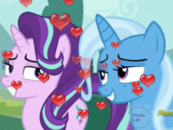 Size: 500x375 | Tagged: safe, edit, edited screencap, imported from derpibooru, screencap, starlight glimmer, trixie, pony, unicorn, no second prances, animated, bedroom eyes, discovery family logo, female, floating heart, gif, heart, lesbian, looking at each other, photo lab, shipping, startrix