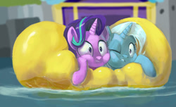 Size: 1024x623 | Tagged: safe, artist:grissaecrim, artist:raikoh, imported from derpibooru, starlight glimmer, trixie, pony, unicorn, road to friendship, cheek squish, cheek to cheek, duo, female, ghastly gorge, i guess we're stuck together, inflatable, inflatable raft, mare, one eye closed, prone, raft, river, scene interpretation, shipping fuel, squished, squishy, squishy cheeks, water, we're friendship bound