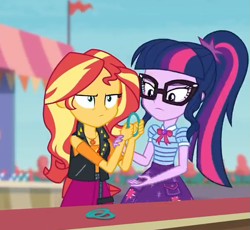 Size: 587x540 | Tagged: safe, imported from derpibooru, screencap, sci-twi, sunset shimmer, twilight sparkle, equestria girls, equestria girls series, rollercoaster of friendship, clothes, cropped, female, geode of empathy, geode of telekinesis, glasses, jacket, leather jacket, ponytail, shirt, shrunken pupils, skirt