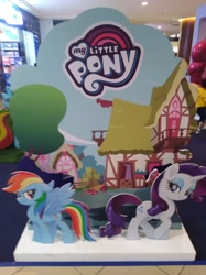 Size: 3016x4032 | Tagged: safe, imported from derpibooru, photographer:horsesplease, rainbow dash, rarity, pegasus, pony, unicorn, my little pony: the movie, malaysia, my little pony logo