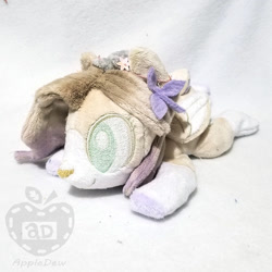 Size: 900x900 | Tagged: safe, artist:appledew, imported from derpibooru, oc, oc only, oc:belle, pegasus, pony, beanie (plushie), female, folded wings, irl, mare, photo, plushie, prone, solo, wings