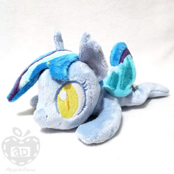 Size: 1000x1000 | Tagged: safe, artist:appledew, imported from derpibooru, oc, oc only, oc:star struck, bat pony, pony, bat wings, beanie (plushie), ear fluff, female, irl, mare, photo, plushie, prone, slit eyes, slit pupils, solo, wings