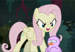 Size: 1345x941 | Tagged: safe, imported from derpibooru, screencap, mean fluttershy, bird, pony, the mean 6, clone, cropped, evil grin, female, flutterbitch, grin, open mouth, sinister, smiling