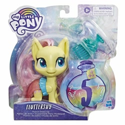 Size: 1500x1500 | Tagged: safe, imported from derpibooru, fluttershy, mermaid, pegasus, pony, my little pony: pony life, brush, brushable, clothes, doll, dress, female, g4.5, hasbro, irl, mare, merchandise, photo, reveal the magic, toy