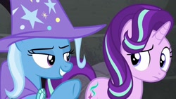 Size: 1280x720 | Tagged: safe, imported from derpibooru, screencap, starlight glimmer, trixie, pony, unicorn, to where and back again, cape, clothes, duo, duo female, female, hat, mare, trixie's cape, trixie's hat