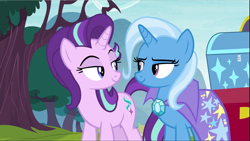Size: 1669x939 | Tagged: safe, imported from derpibooru, screencap, starlight glimmer, trixie, pony, unicorn, road to friendship, cape, clothes, cropped, duo, female, lidded eyes, looking at each other, mare, smiling, trixie's cape