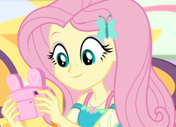 Size: 1494x1080 | Tagged: safe, imported from derpibooru, screencap, fluttershy, equestria girls, equestria girls series, holidays unwrapped, spoiler:eqg series (season 2), camera, canterlot mall, chair, clothes, cropped, cute, dashing through the mall, dress, female, geode of fauna, hairclip, happy, jewelry, looking down, magical geodes, mall, necklace, present, shyabetes, sitting, smiling, solo