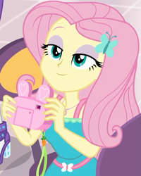 Size: 799x997 | Tagged: safe, imported from derpibooru, screencap, fluttershy, rarity, equestria girls, equestria girls series, holidays unwrapped, spoiler:eqg series (season 2), bunny ears, camera, canterlot mall, clothes, cropped, cute, dashing through the mall, dress, female, flower, fluttershy boho dress, geode of fauna, hairclip, happy, jewelry, lidded eyes, looking up, magical geodes, mall, necklace, present, shyabetes, smiling, waistband