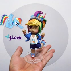 Size: 1080x1080 | Tagged: safe, artist:valente, imported from derpibooru, kotobukiya, rainbow dash, human, pony, chibi, cute, dashabetes, human ponidox, humanized, kotobukiya rainbow dash, one eye closed, self ponidox, wink