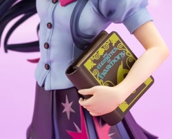 Size: 822x667 | Tagged: safe, imported from derpibooru, kotobukiya, twilight sparkle, human, equestria girls, book, clothes, doll, figure, humanized, irl, moe, photo, pleated skirt, skirt, toy