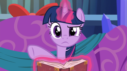 Size: 1662x934 | Tagged: safe, imported from derpibooru, screencap, twilight sparkle, alicorn, pony, a hearth's warming tail, book, confused, female, glowing horn, levitation, looking at you, magic, mare, raised eyebrow, solo, telekinesis, twilight sparkle (alicorn)