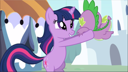 Size: 1669x941 | Tagged: safe, imported from derpibooru, screencap, spike, twilight sparkle, dragon, pony, unicorn, the crystal empire, bipedal, cute, duo, female, male, mare, smiling, twiabetes, unicorn twilight