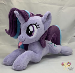 Size: 900x880 | Tagged: safe, artist:ketika, imported from derpibooru, starlight glimmer, pony, unicorn, :p, female, irl, lying down, mare, photo, plushie, prone, silly, smiling, solo, tongue out