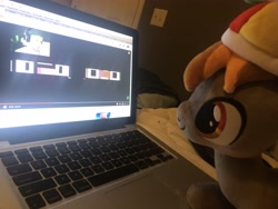 Size: 4032x3024 | Tagged: safe, artist:undeadponysoldier, imported from derpibooru, photographer:undeadponysoldier, button mash, pony, buttonbetes, computer, cute, game, irl, jacksepticeye, laptop computer, photo, plushie, reaction, the narrator is a dick, youtube