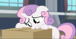 Size: 1612x843 | Tagged: safe, imported from derpibooru, screencap, sweetie belle, pony, unicorn, for whom the sweetie belle toils, box, cardboard box, cropped, female, filly, floppy ears, foal, leaning, regret, sad, solo, teeth