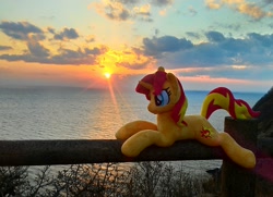 Size: 1984x1440 | Tagged: safe, artist:hihin1993, imported from derpibooru, sunset shimmer, pony, unicorn, female, irl, japan, mare, ocean, photo, plushie, smiling, solo, sun, sunset, sunshine shimmer