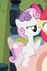 Size: 497x745 | Tagged: safe, imported from derpibooru, screencap, apple bloom, sweetie belle, earth pony, pony, unicorn, family appreciation day, bed, bowl, cropped, evil grin, female, filly, food, grapes, grin, offscreen character, sitting, smiling, solo focus