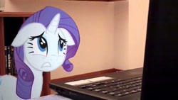 Size: 1280x720 | Tagged: safe, imported from derpibooru, rarity, pony, computer, floppy ears, irl, laptop computer, looking, photo, ponies in real life, solo