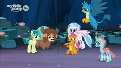 Size: 1675x942 | Tagged: safe, imported from derpibooru, screencap, gallus, ocellus, sandbar, silverstream, smolder, yona, changedling, changeling, classical hippogriff, dragon, earth pony, griffon, hippogriff, pony, yak, uprooted, bow, cave of harmony, cloven hooves, colored hooves, cutie mark, dragoness, female, hair bow, jewelry, male, monkey swings, necklace, paws, student six, tail, teenager, wings
