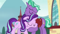 Size: 1024x576 | Tagged: safe, imported from derpibooru, screencap, firelight, starlight glimmer, pony, unicorn, the parent map, cute, eyes closed, father and daughter, female, hug, male, mare, reformed starlight, stallion