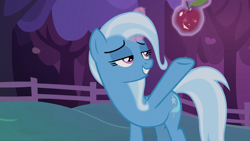 Size: 1280x720 | Tagged: safe, imported from derpibooru, screencap, trixie, pony, uncommon bond, apple, female, food, levitation, lidded eyes, magic, solo, telekinesis