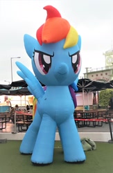 Size: 1121x1716 | Tagged: safe, imported from derpibooru, photographer:yinglong, photographer:yinglongfujun, rainbow dash, pony, >:), friendship carnival, hong kong, inflatable, macro, smiling, smirk