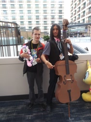 Size: 4160x3120 | Tagged: safe, imported from derpibooru, octavia melody, human, babscon, babscon 2019, bow (instrument), brony, cello, clothes, convention, cosplay, costume, irl, irl human, musical instrument, photo