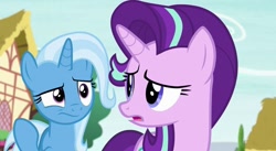 Size: 925x506 | Tagged: safe, imported from derpibooru, screencap, starlight glimmer, trixie, pony, unicorn, to where and back again, confused, female, looking at each other, looking back, mare, ponyville
