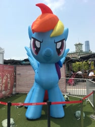 Size: 720x960 | Tagged: safe, imported from derpibooru, photographer:henrychan, rainbow dash, pegasus, pony, >:), friendship festival, hong kong, inflatable, irl, photo, smiling, smirk