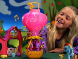 Size: 480x360 | Tagged: safe, imported from derpibooru, screencap, pinkie pie, rainbow dash, spike, twilight sparkle, human, 2010, commercial, electronic toy, hot air balloon, irl, irl human, it's twilight sparkle's balloon, official, photo, target demographic, toy, twinkling balloon