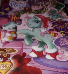 Size: 1819x1981 | Tagged: safe, imported from derpibooru, minty, pony, a very minty christmas, 2005, christmas, christmas tree, clothes, cookie, cover, decoration, denmark, dubs, dvd, female, food, g3, hat, heart, holiday, holiday special, mare, my little pony, photo, rearing, region 2 dvds, sack, santa hat, santa sack, socks, sticker, stockings, thigh highs, tree, used