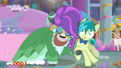 Size: 1366x768 | Tagged: safe, imported from derpibooru, screencap, sandbar, yona, earth pony, pony, yak, she's all yak, alternate hairstyle, blushing, bowl, bowtie, bucket, clothes, cloven hooves, cup, dress, duo, ear piercing, earring, eyeshadow, female, food, jewelry, lemon, makeup, male, pearl earrings, piercing, punch (drink), punch bowl, teenager, wig