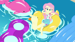 Size: 1280x720 | Tagged: safe, imported from derpibooru, screencap, fluttershy, equestria girls, equestria girls series, i'm on a yacht, spoiler:eqg series (season 2), barefoot, clothes, eyeshadow, feet, female, fetish fuel, flutterfeet, foot focus, lidded eyes, makeup, not-so-shy fluttershy, pool toy, shorts, soles, solo, swimming pool, wiggling toes